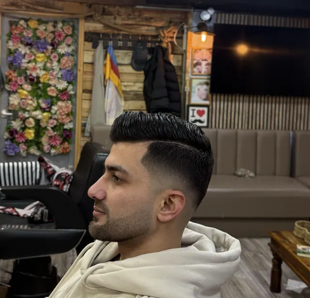 A fade and beard in the chair at New Styles